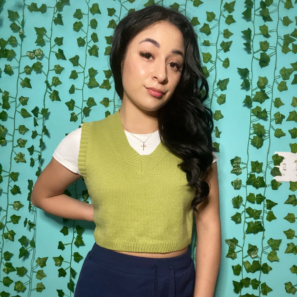 green sweater vest